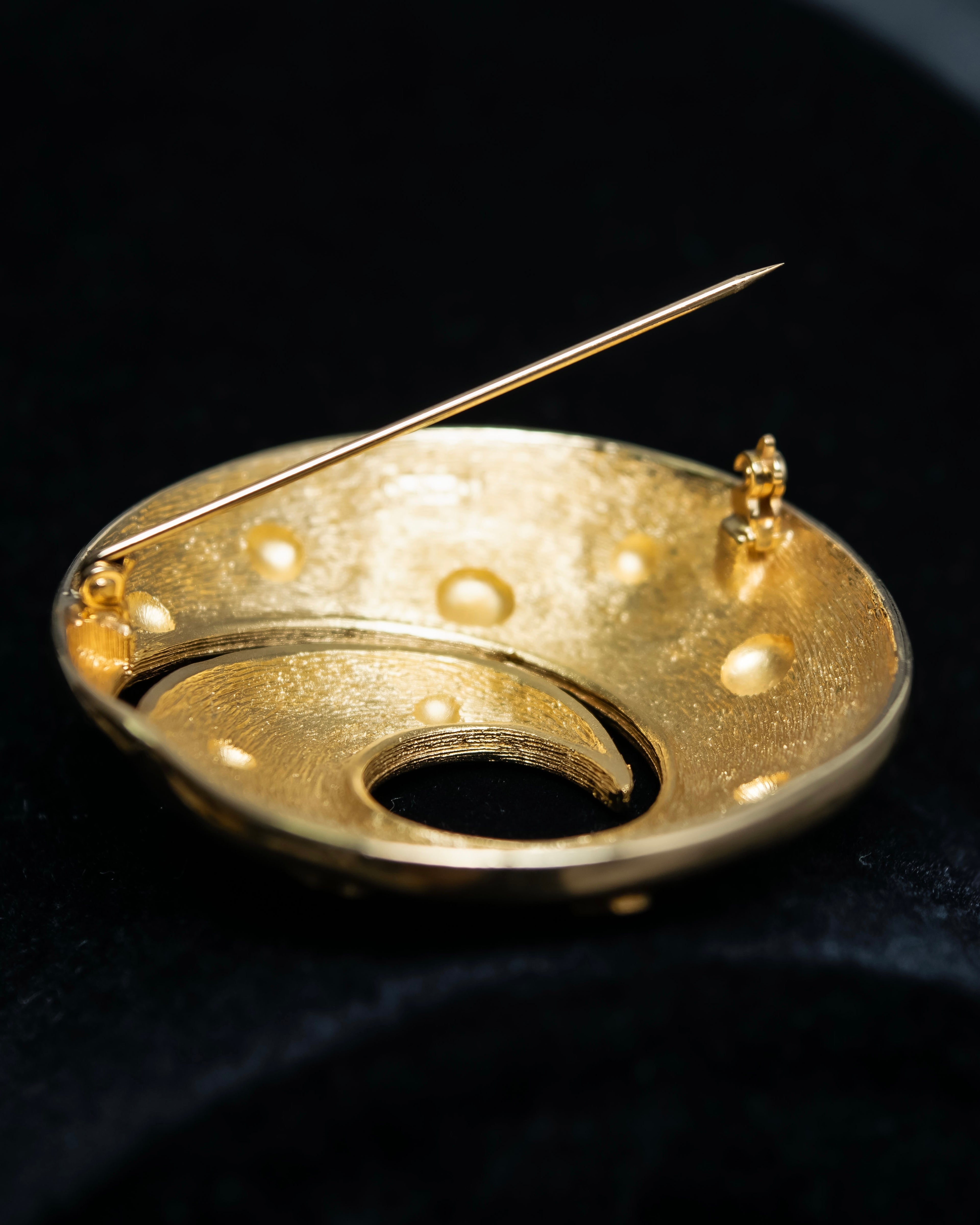 "DIOR" Gold spiral motif brooch