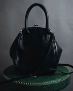 "Y’s" 22AW sculptural kiss-lock leather bag