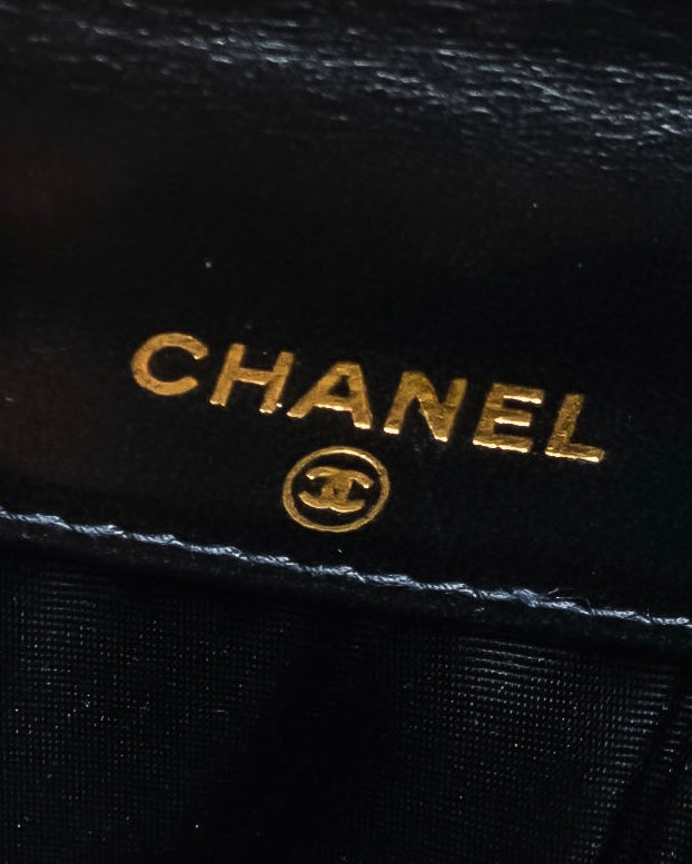 "CHANEL" Coco Mark engraved caviar skin bi fold wallet