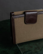 "PRADA" Logo engraved canvas＆leather combination short wallet