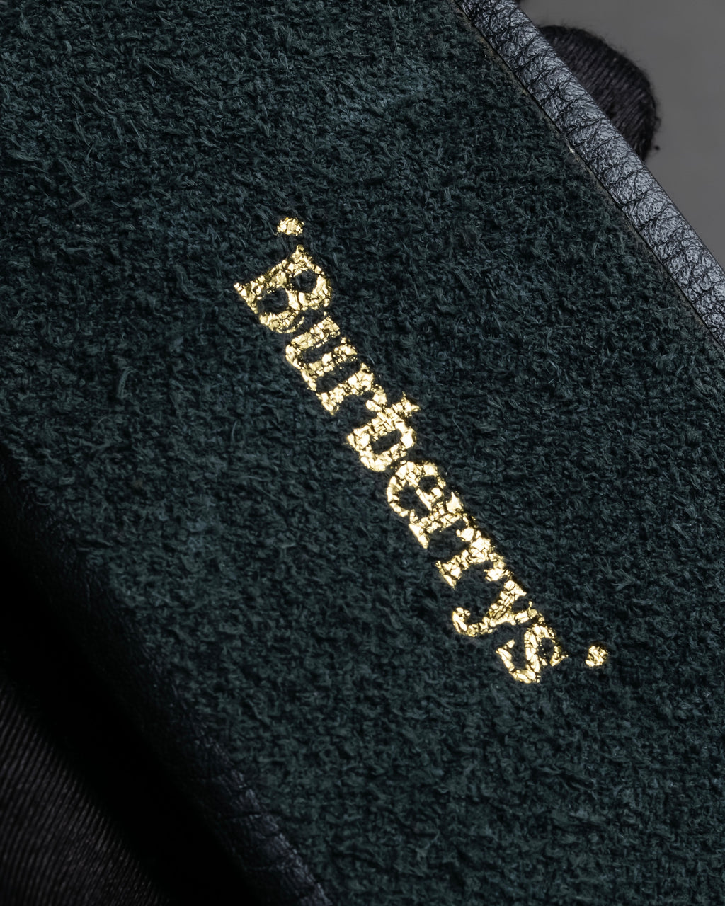 "BURBERRYS" Oval buckle design, supple leather belt