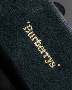 "BURBERRYS" Oval buckle design, supple leather belt