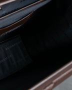 "BURBERRY" Metal belt design embossed PVC briefcase