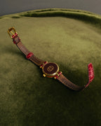 "GUCCI" 80's-90's Sherry line web stripe round watch with roman dial