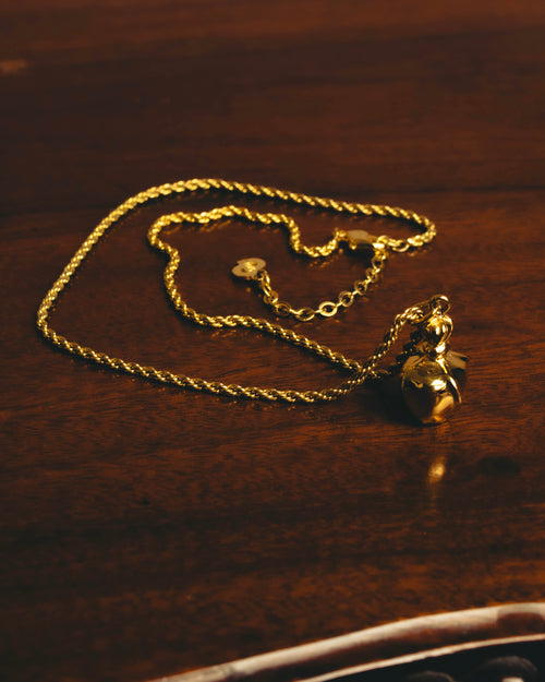 "Christian Dior" 80's-90's Gold tone bottle pendant necklace
