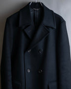 "JOHN LAWRENCE SULLIVAN"
 Large lapel double-breasted mid length coat