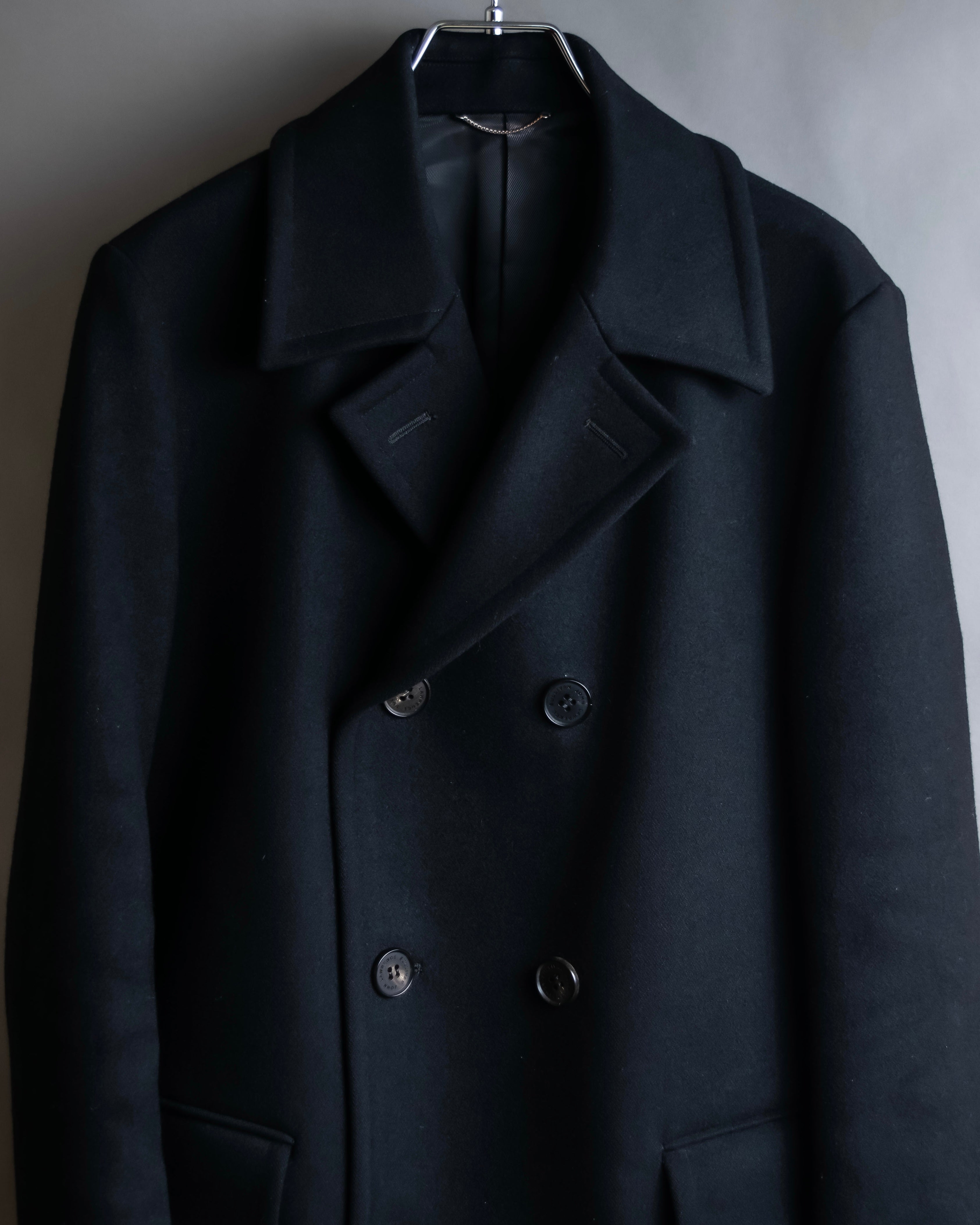 "JOHN LAWRENCE SULLIVAN"
 Large lapel double-breasted mid length coat