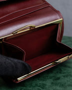 "Cartier" Les Must de Cartier bordeaux color leather wallet