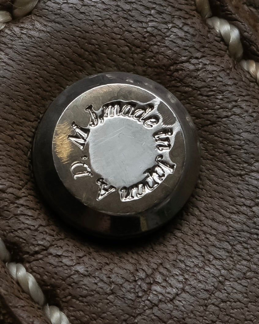 "Mademoiselle Accessories"
 Silver parts design leather one handle bag