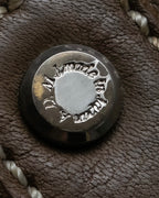 "Mademoiselle Accessories"
 Silver parts design leather one handle bag