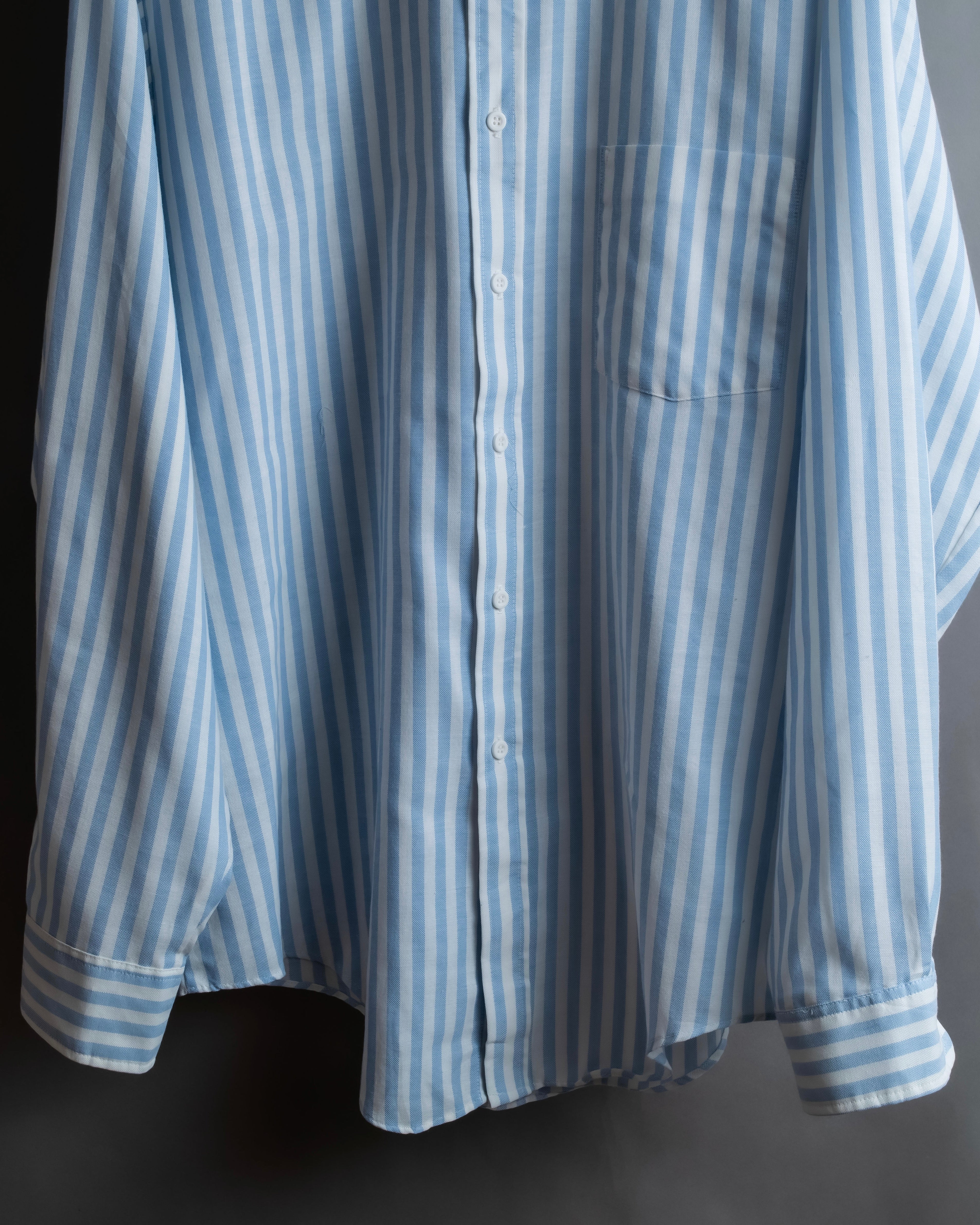"Vintage light blue striped button-down shirt"