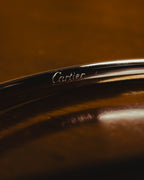 "Cartier" 80's Sculptural ring-handle leather wallet