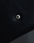 "YVES SAINT LAURENT" Stud-embellished monogram bi-fold wallet