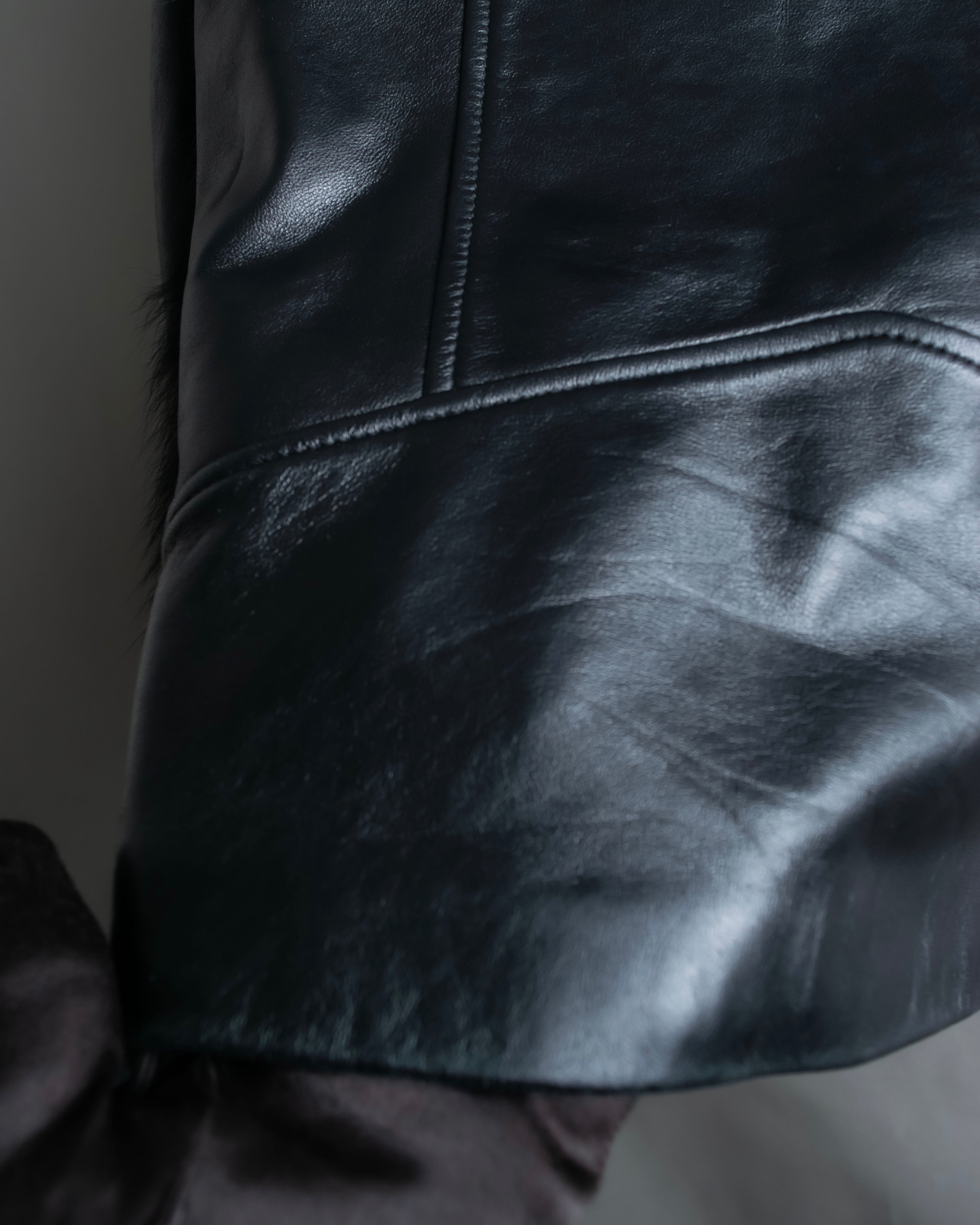 "MOROKO BAR" Real fur docking leather jacket