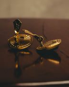 "Yves Saint Laurent" 80's-90's Sculptural black cabochon clip-on earrings