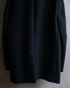 "JOHN LAWRENCE SULLIVAN"
 Large lapel double-breasted mid length coat