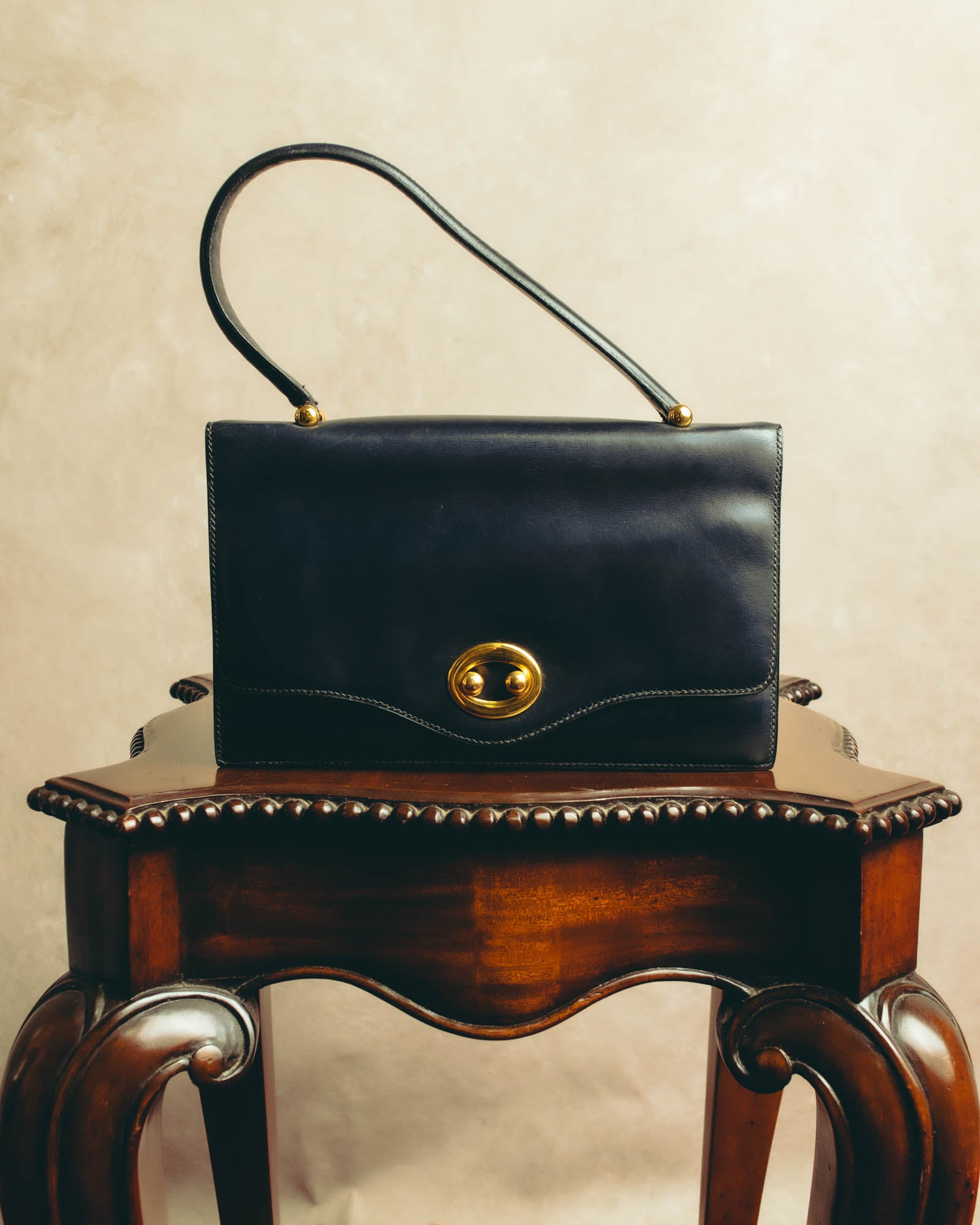 -SPECIAL- “HERMÈS” 50’s-60’s sculptural oval clasp midnight navy leather handbag