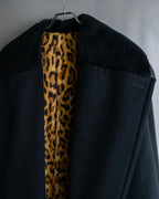 "GIANNI VERSACE UPDATE"
 Fur trimmed wool cashmere maxi double breasted coat