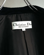 首元に配された「Christian Dior PRÊT-À-PORTER」の織りネームと、サイズS表記を確認できる内側のカット。滑らかな裏地の質感も併せて写しています。