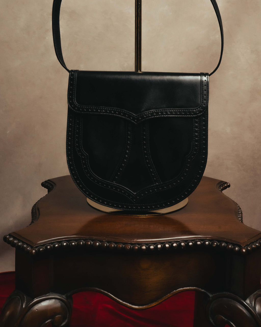 “Yves Saint Laurent” 80’s-90’s Brogue-detailed sculptural leather shoulder bag