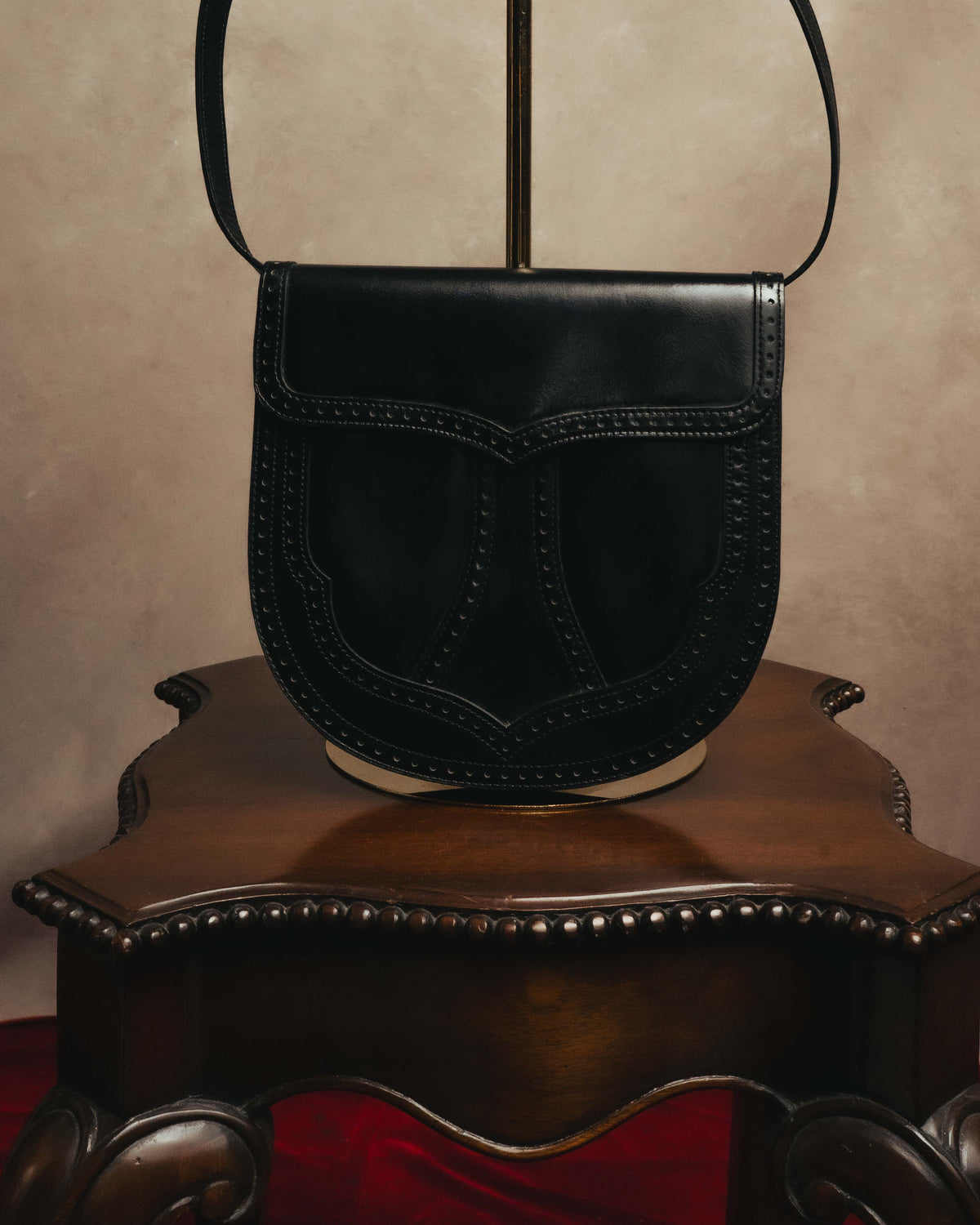 “Yves Saint Laurent” 80’s-90’s Brogue-detailed sculptural leather shoulder bag