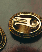 “Christian Dior” 70’s-80’s sculptural hammered oval clip-on earrings