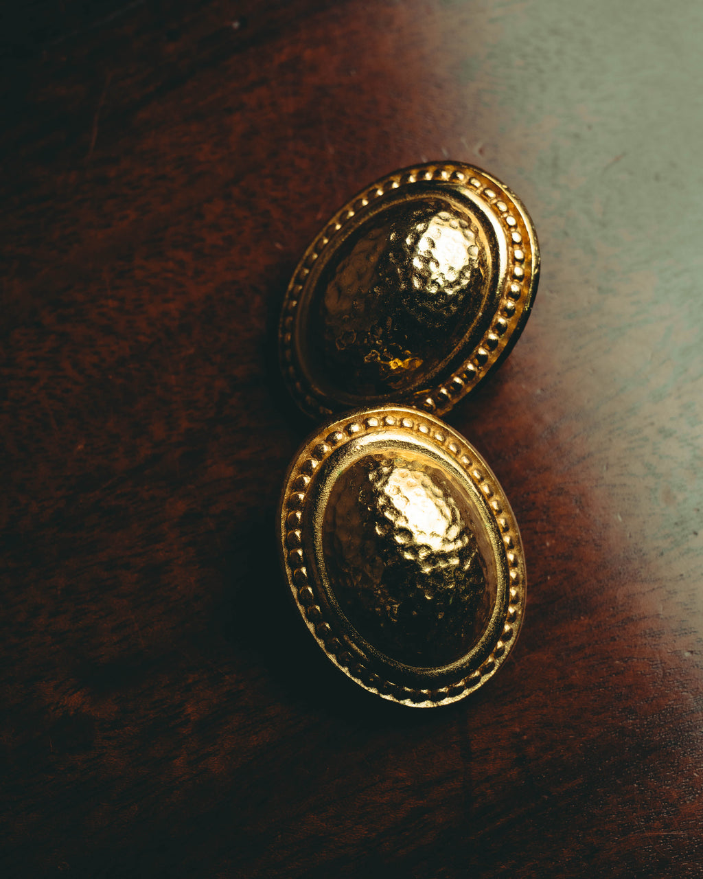 “Christian Dior” 70’s-80’s sculptural hammered oval clip-on earrings