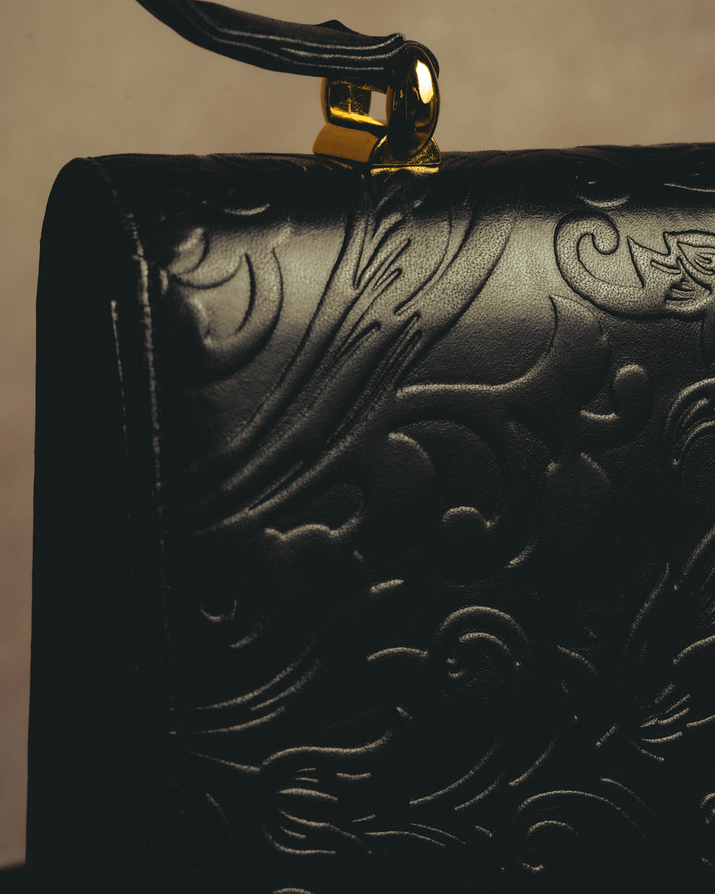 "BALENCIAGA" 80's-90's Ornately embossed leather handbag