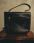 "BALENCIAGA" 80's-90's Ornately embossed leather handbag