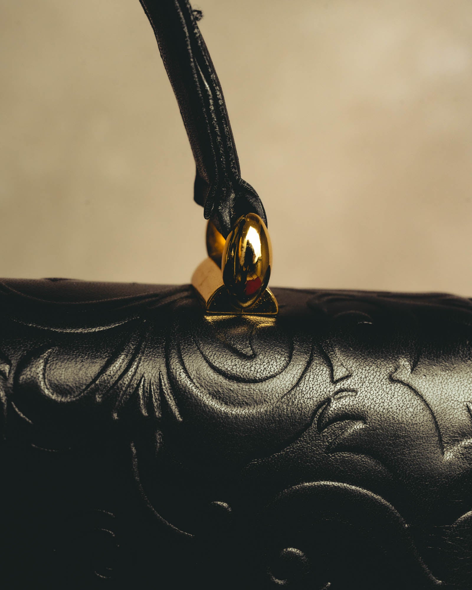 "BALENCIAGA" 80's-90's Ornately embossed leather handbag
