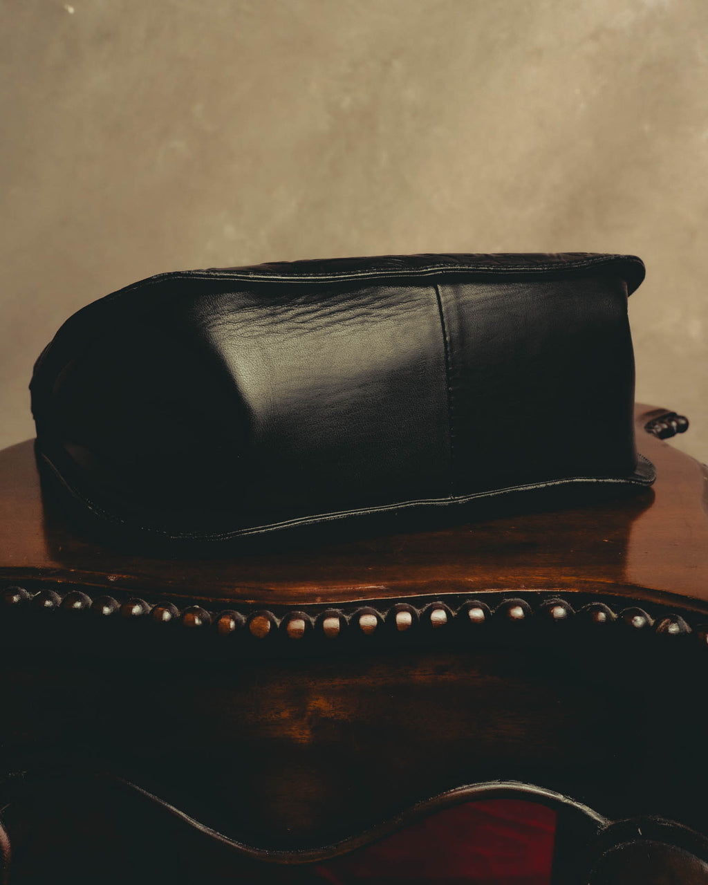 "BALENCIAGA" 80's-90's Ornately embossed leather handbag