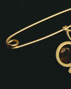 “Maison Margiela” 2020’s gold-tone crystal floral safety-pin brooch