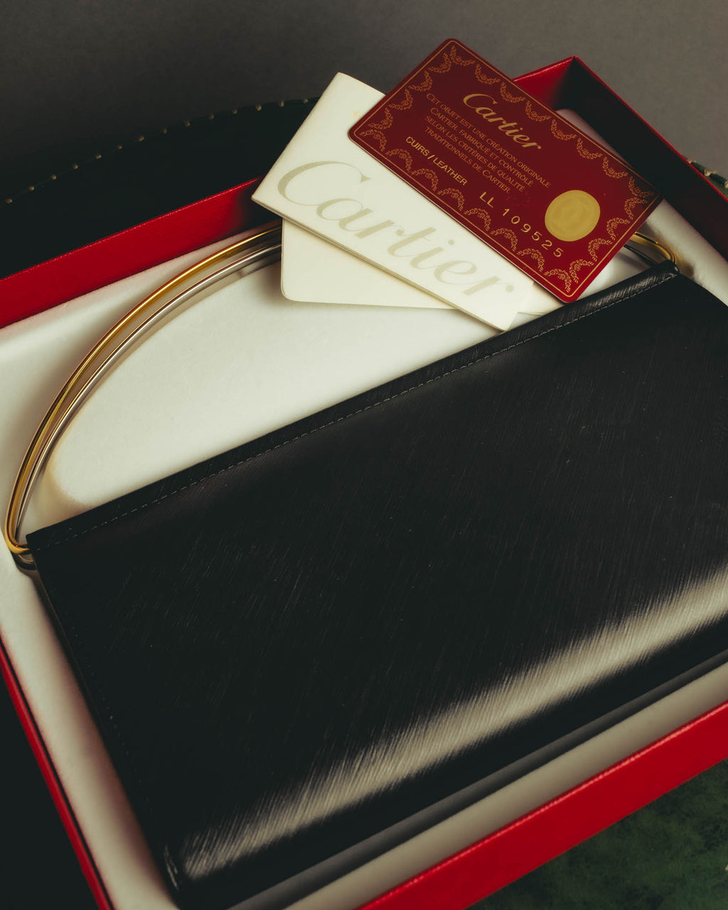"Cartier" 90's-00's Sculptural leather clutch bag