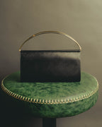 "Cartier" 90's-00's Sculptural leather clutch bag