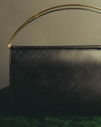 "Cartier" 90's-00's Sculptural leather clutch bag