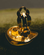 "Yves Saint Laurent" 80's-90's Sculptural gold tone clip-on earrings