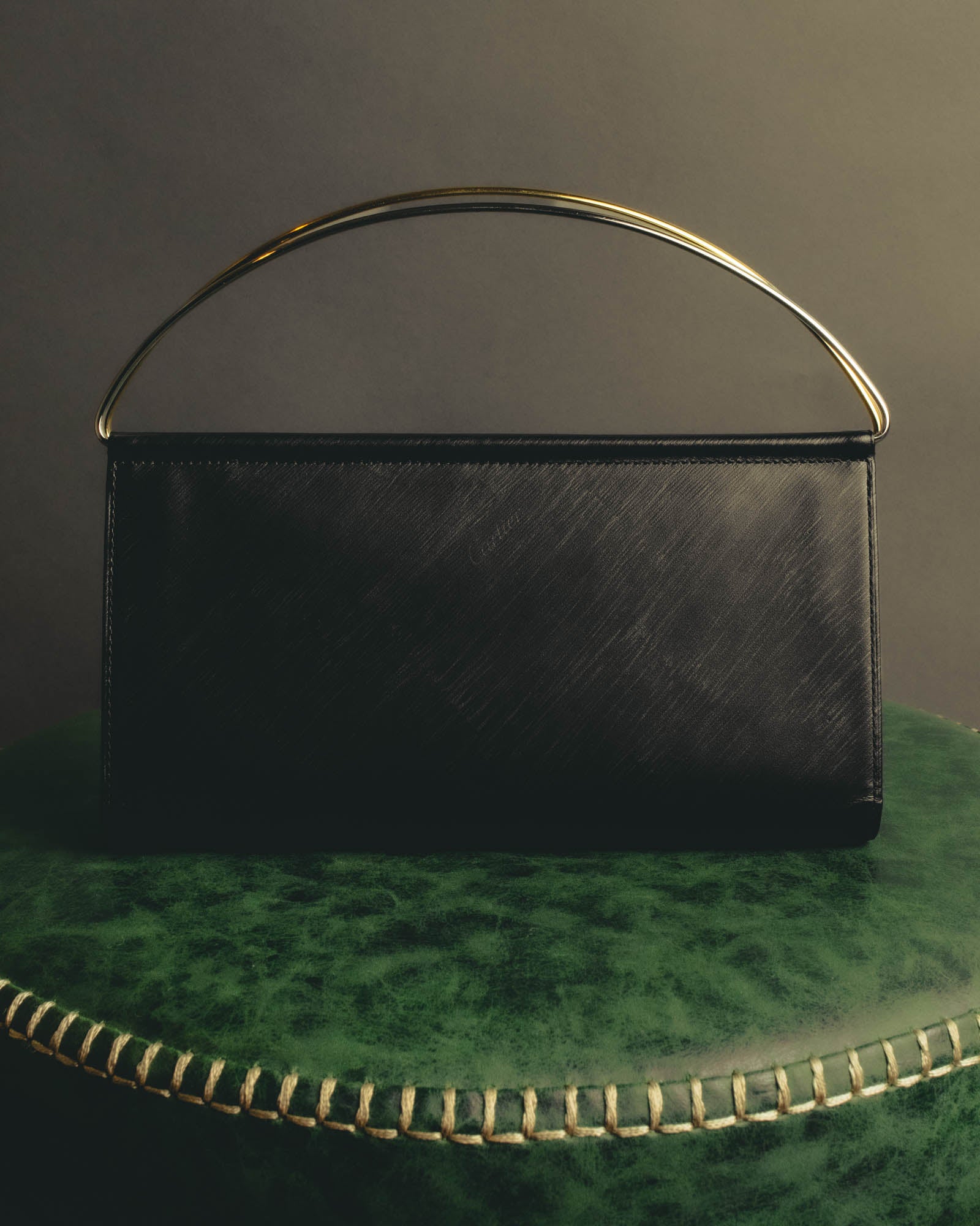 "Cartier" 90's-00's Sculptural leather clutch bag
