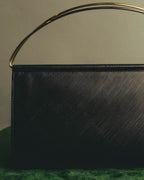 "Cartier" 90's-00's Sculptural leather clutch bag
