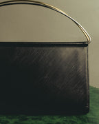"Cartier" 90's-00's Sculptural leather clutch bag