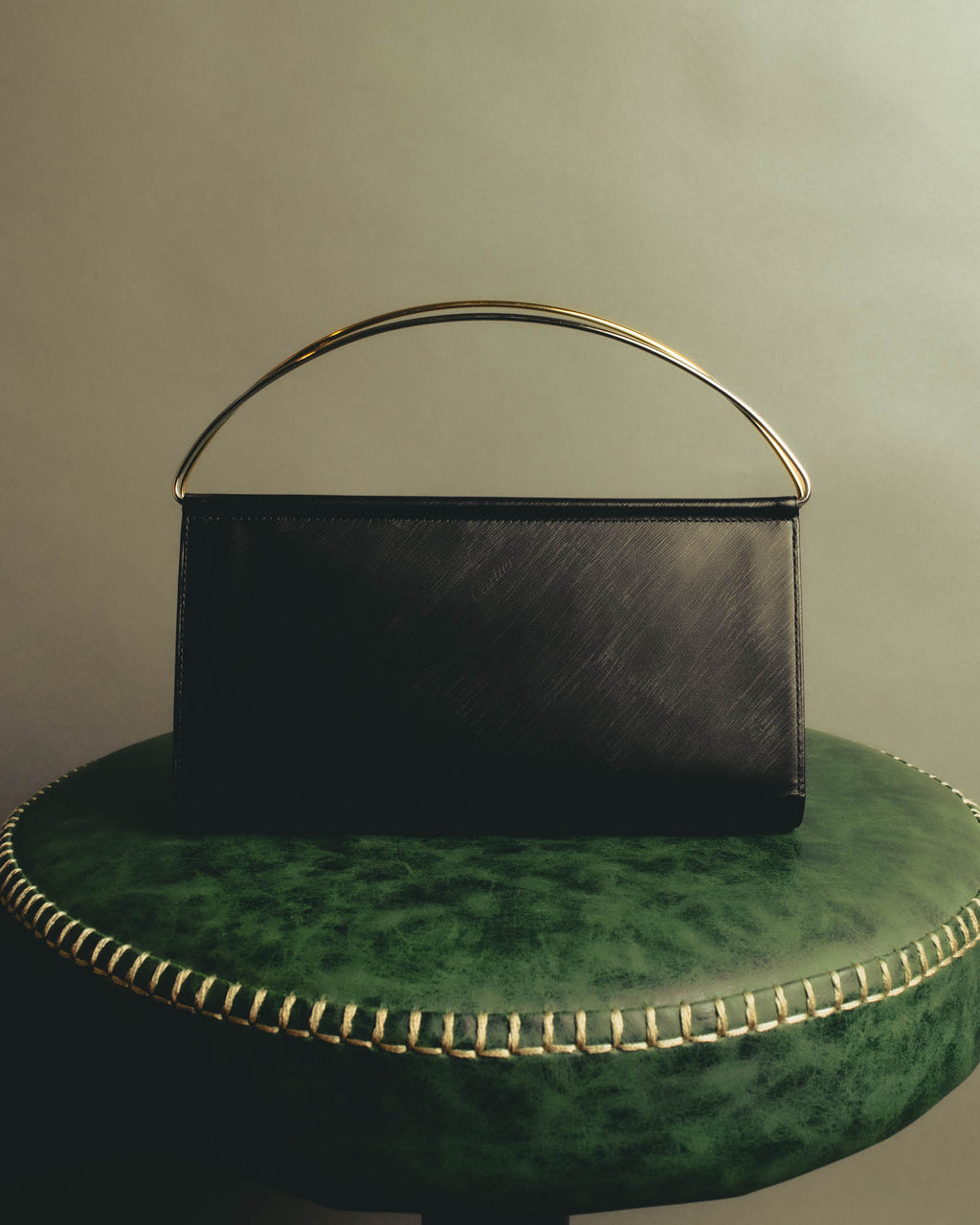 "Cartier" 90's-00's Sculptural leather clutch bag