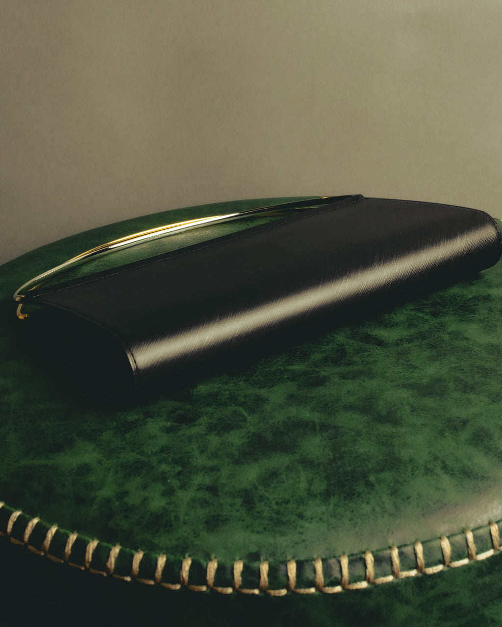 "Cartier" 90's-00's Sculptural leather clutch bag
