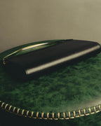 "Cartier" 90's-00's Sculptural leather clutch bag