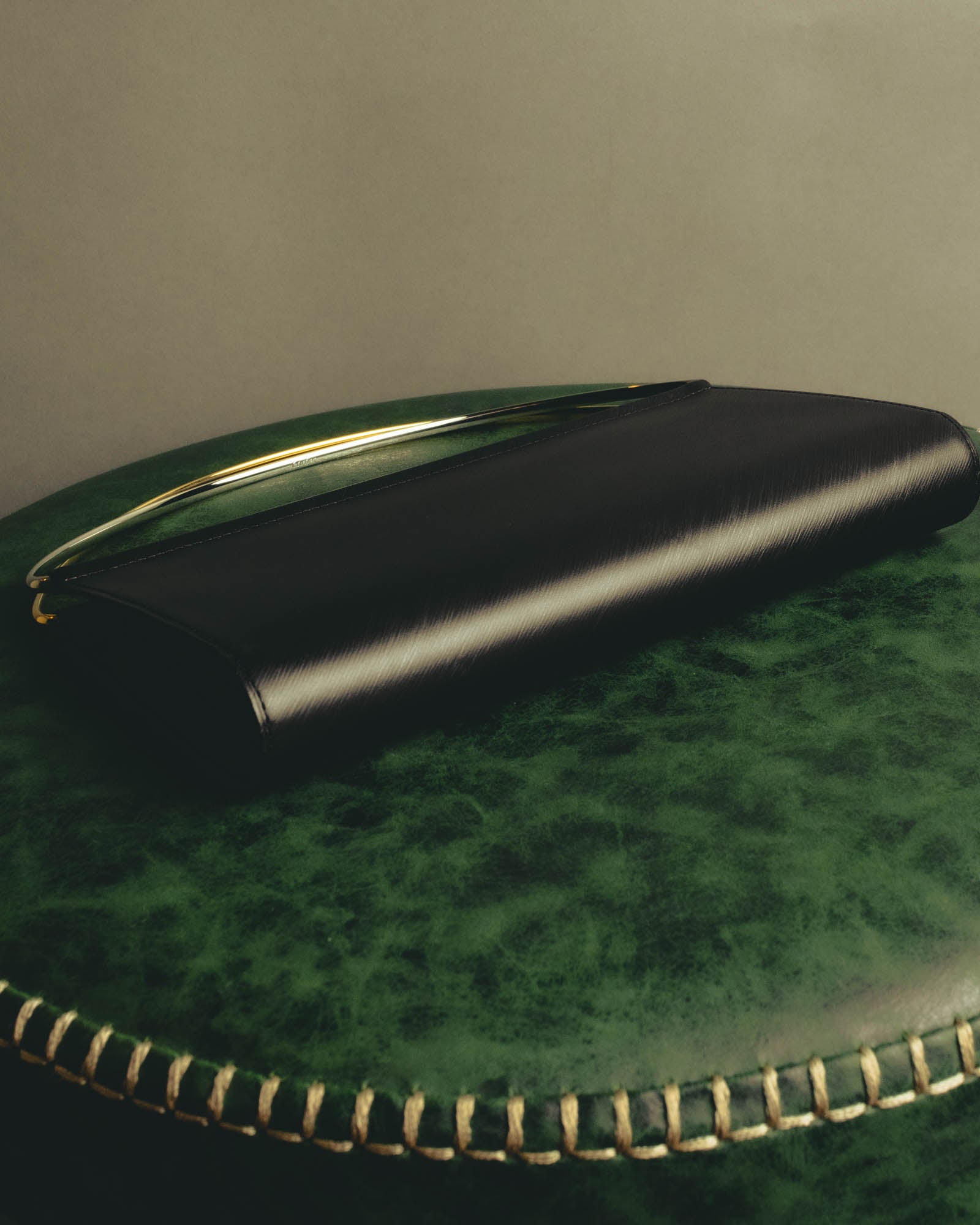"Cartier" 90's-00's Sculptural leather clutch bag