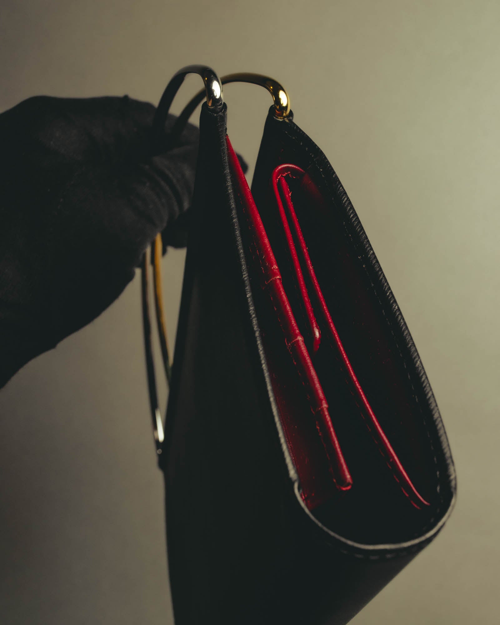 "Cartier" 90's-00's Sculptural leather clutch bag