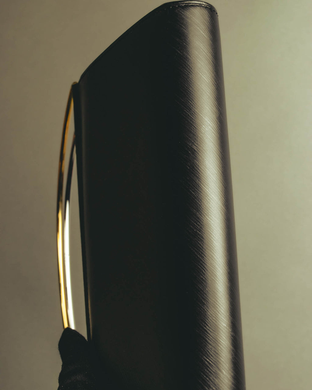 "Cartier" 90's-00's Sculptural leather clutch bag