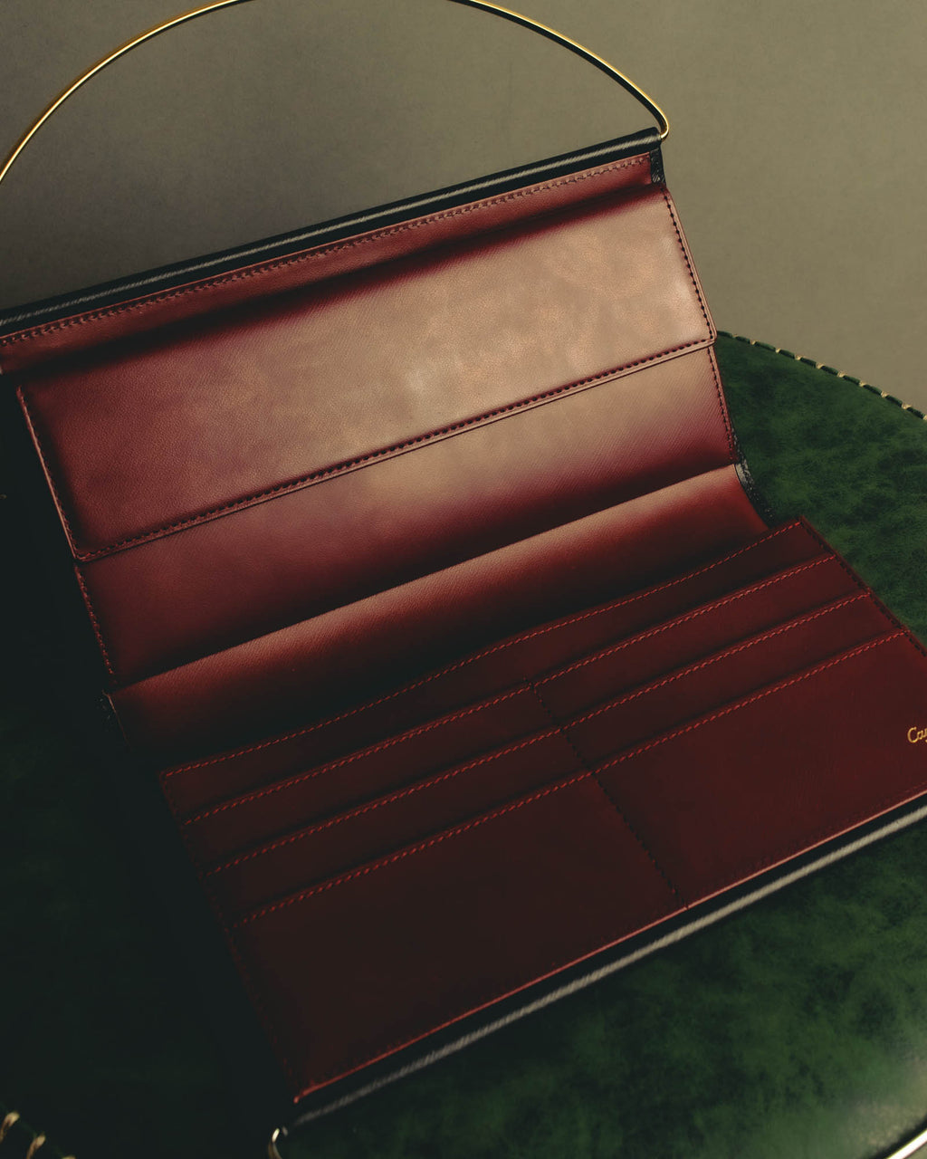 "Cartier" 90's-00's Sculptural leather clutch bag