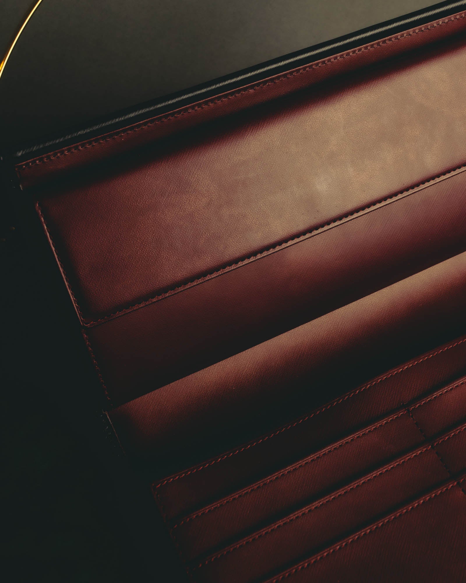 "Cartier" 90's-00's Sculptural leather clutch bag