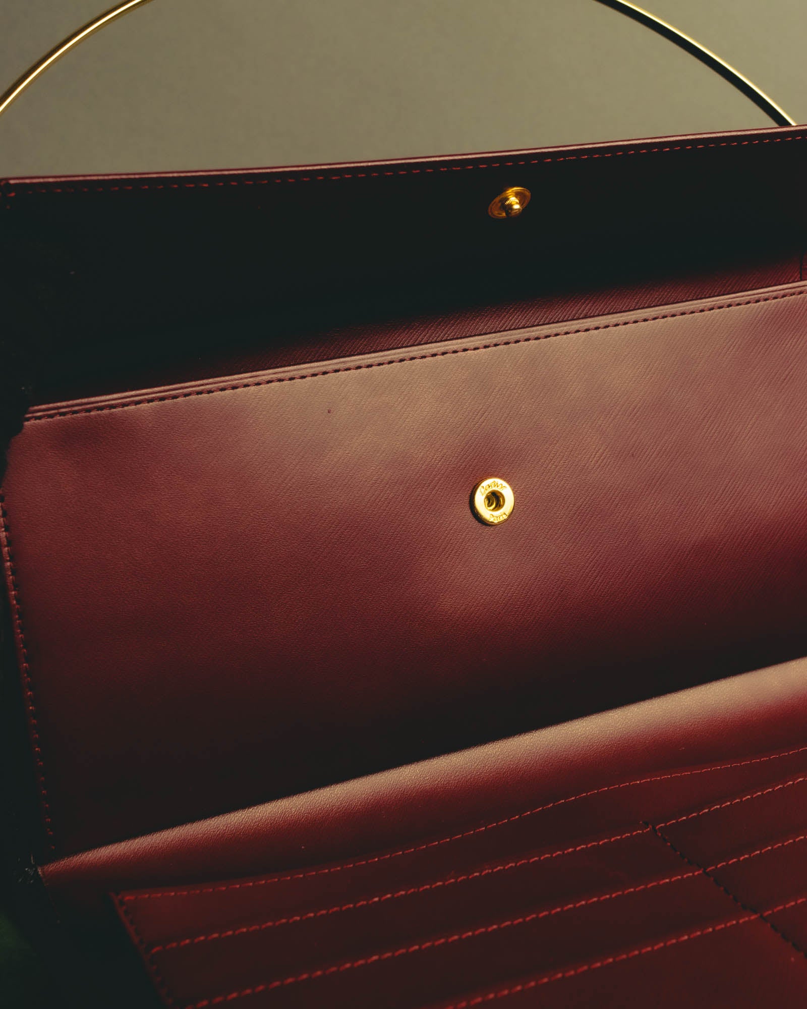 "Cartier" 90's-00's Sculptural leather clutch bag