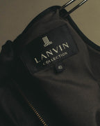 襟元に配された「LANVIN COLLECTION」の織りネームと、サイズ40表記のタグを確認できるカット。滑らかなポリエステル裏地と背面中央のメタルファスナーも写っています。