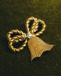 "Christian Dior" 80's-90's Gold tone ribbon tassel brooch